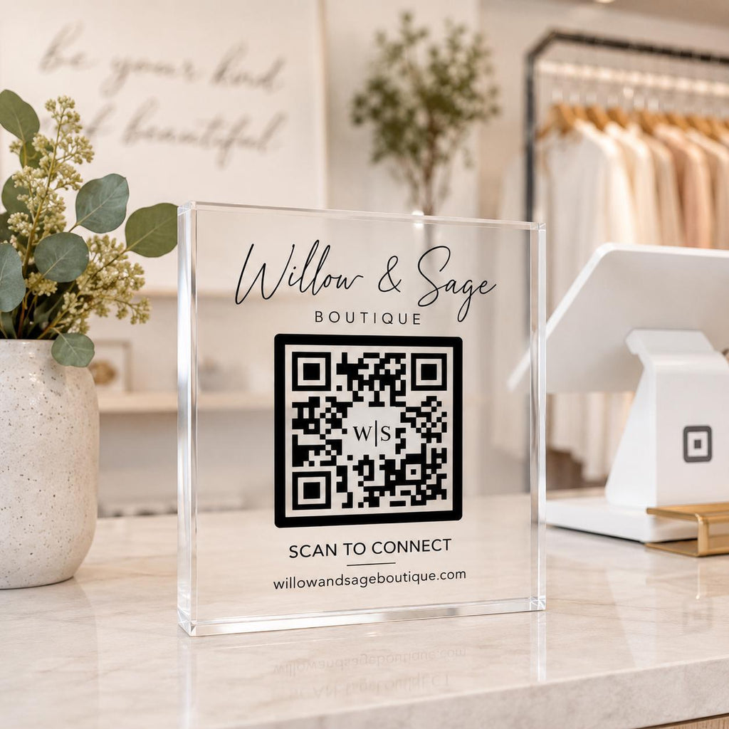 Acrylic QR code sign for business on a counter